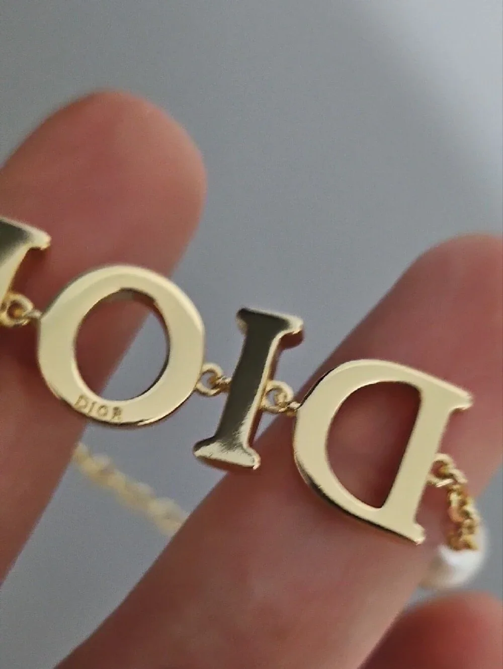 D Letter Gold Tone Logo Bracelet with Pearl Accents
